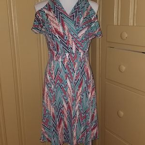 Beautiful cold shoulder multicolor spandex dress.